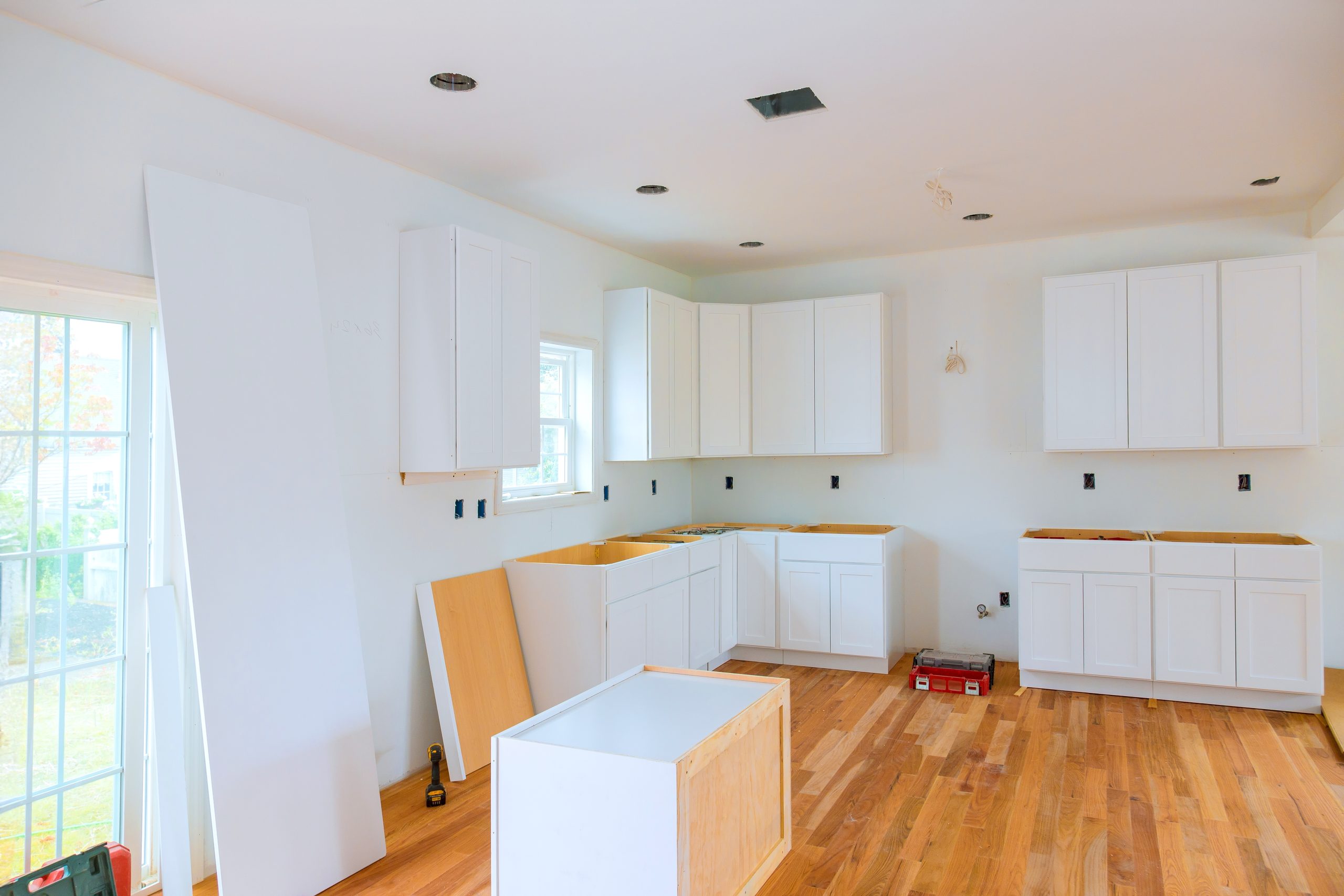During,Construction,Of,New,House,,Custom,Kitchen,Cabinets,Are,Installed